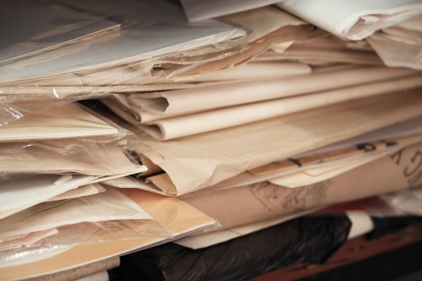 A stack of paper bags. 5