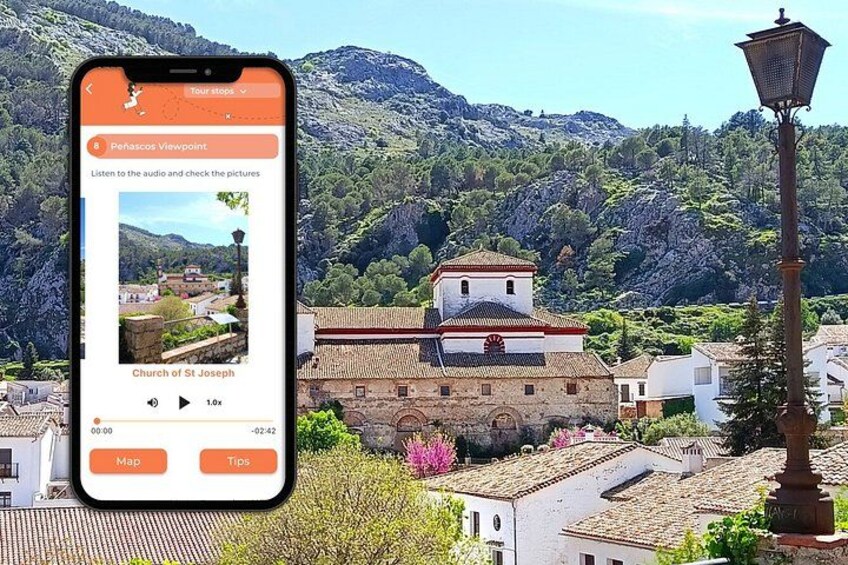 A smartphone displaying a tour stop with a view of a historic church and surrounding buildings. 5