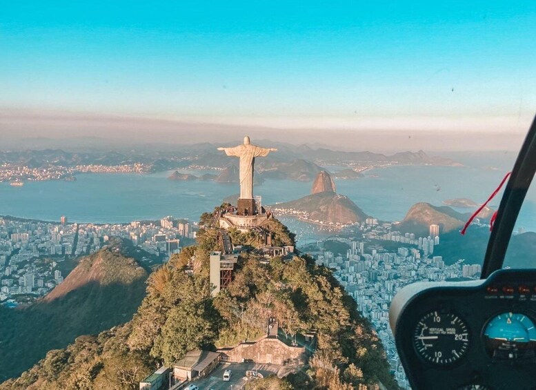 The Christ the Redeemer statue in Rio de Janeiro, Brazil, overlooking the city and Guanabara Bay. 1