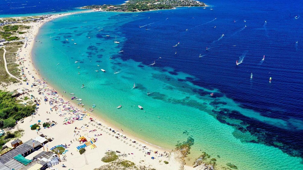 Porto Pollo, private boat tour from Portisco, Yoga and Watersports lessons 1