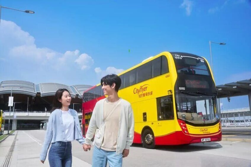 A double-decker bus with 'CityFlyer' written on it, a person holding hands with another, and a modern building in the background. 3
