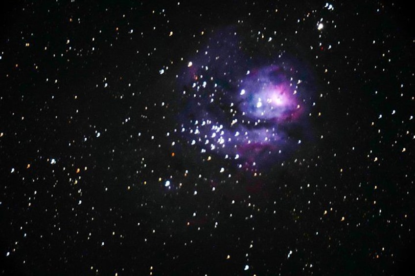 A starry night sky with a prominent nebula. 5