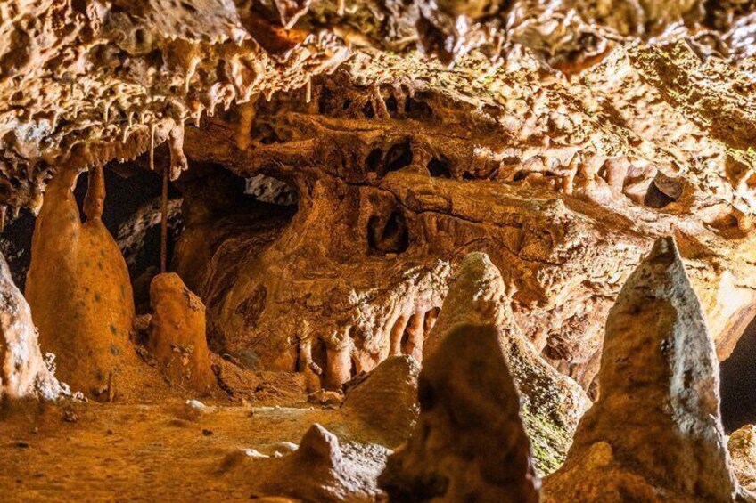 A cave with stalactites and stalagmites. 4