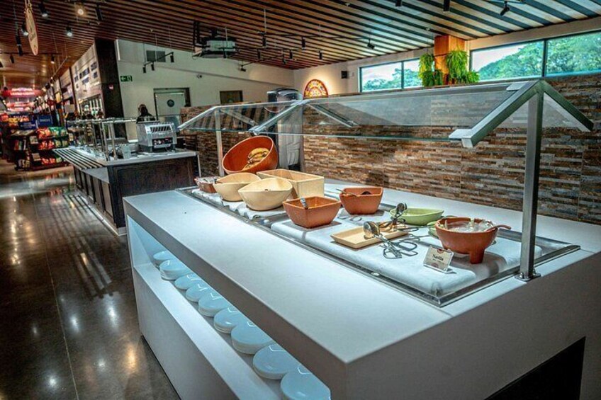 A modern interior with a display of pottery and kitchenware. 2