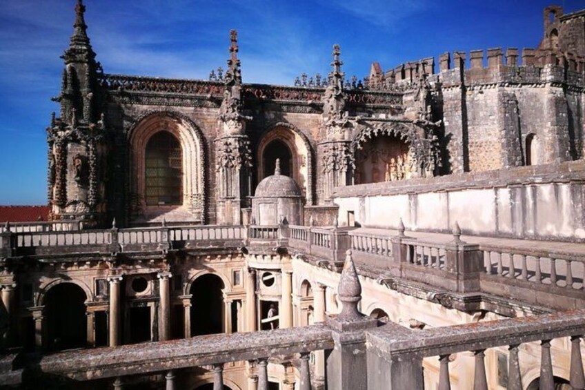 A historic building with intricate architecture, including arched windows and ornate decorations. 5