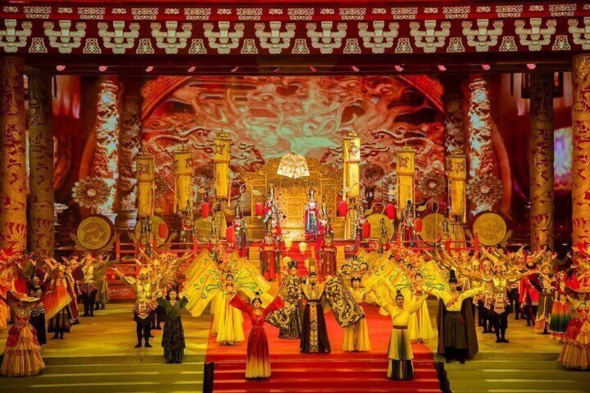 A traditional Chinese opera performance with elaborate costumes and a stage decorated with cultural motifs. 4