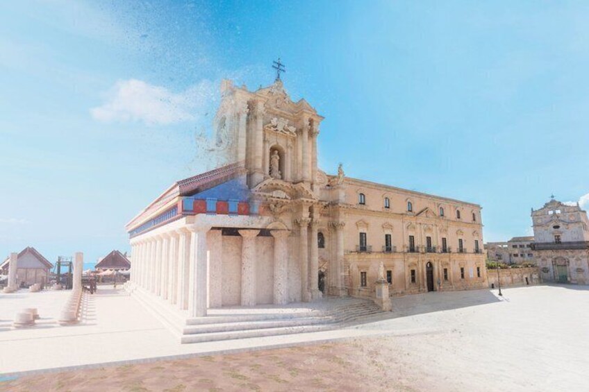 A historical building with a bell tower, steps leading up to it, and a clear sky. 3