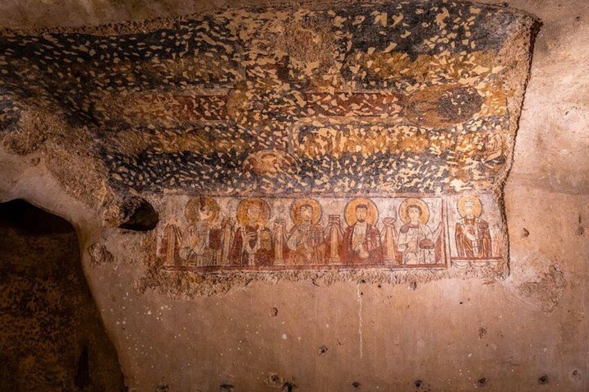 A mosaic with religious figures and a detailed background. 5