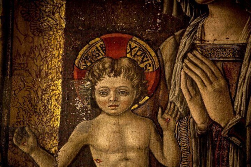 A historical painting with a child figure, a halo, and a woman in a patterned dress. 3