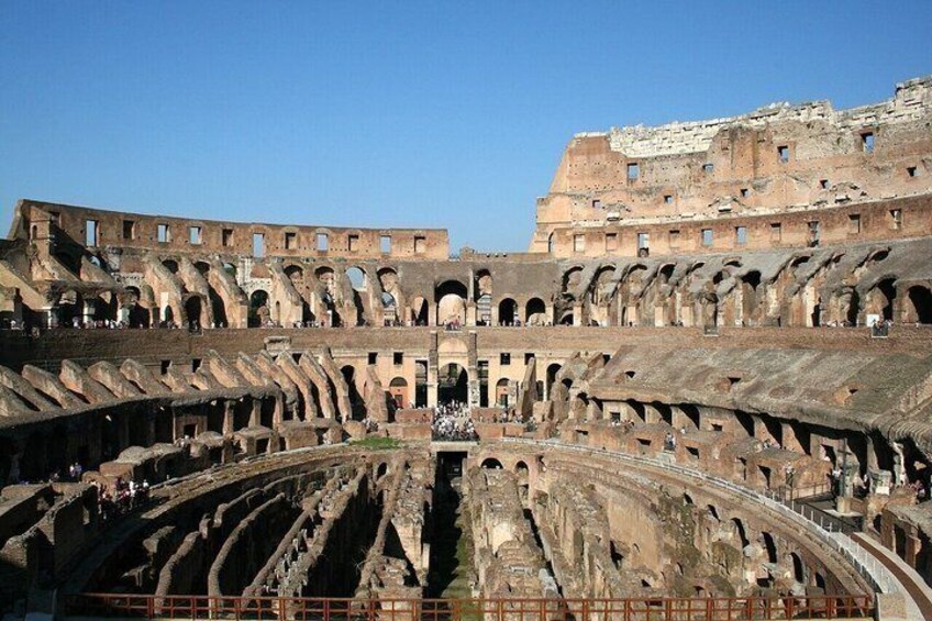 The Colosseum with multiple arches and ruins. 3