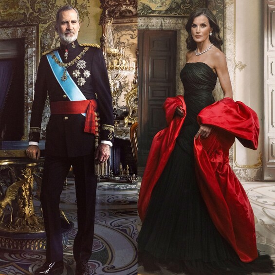A man in a military uniform with a sash and a woman in a red dress with a matching shawl in an ornate room with a chandelier. 4