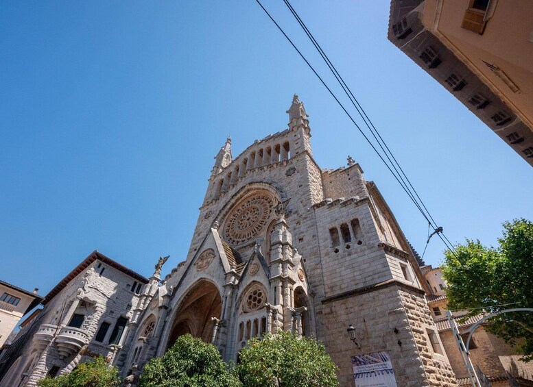 A historic cathedral with intricate Gothic architecture, including pointed arches and detailed stone carvings. 4