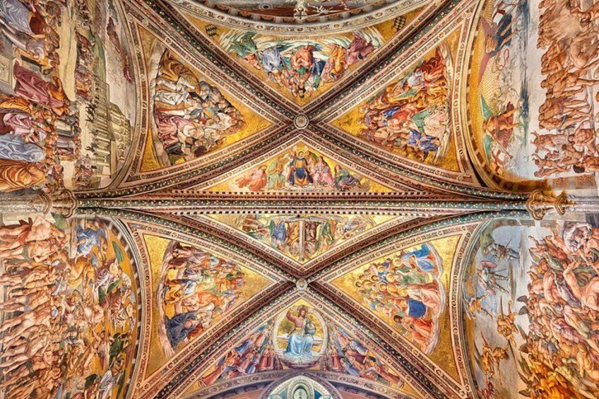 A detailed ceiling fresco with intricate artwork and architectural elements. 3