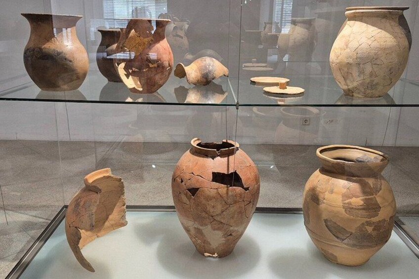 Ancient pottery displayed in a museum. 1