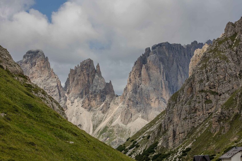 A mountainous landscape with rocky peaks and a valley. 1