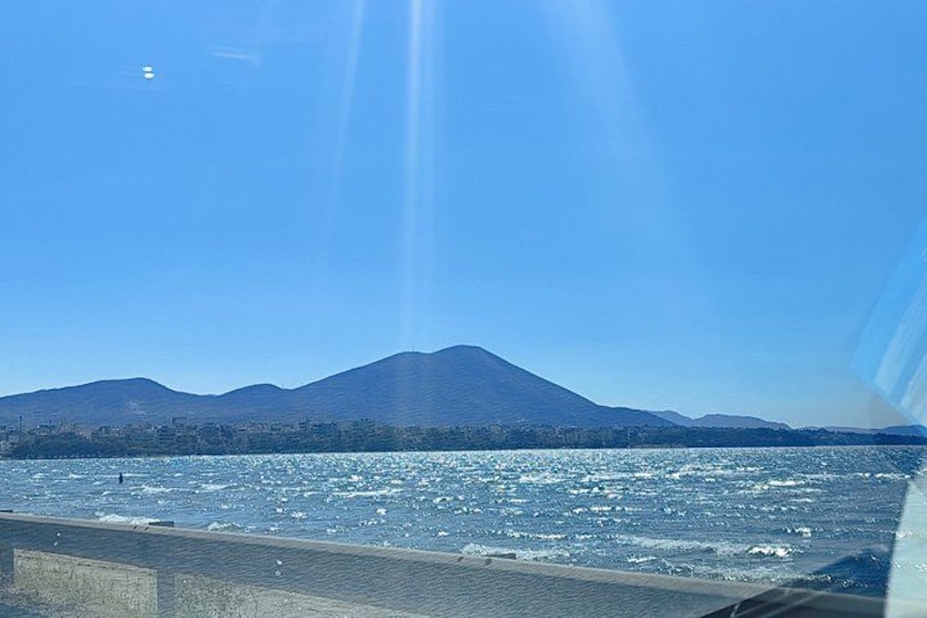A body of water with a mountain in the background. 5