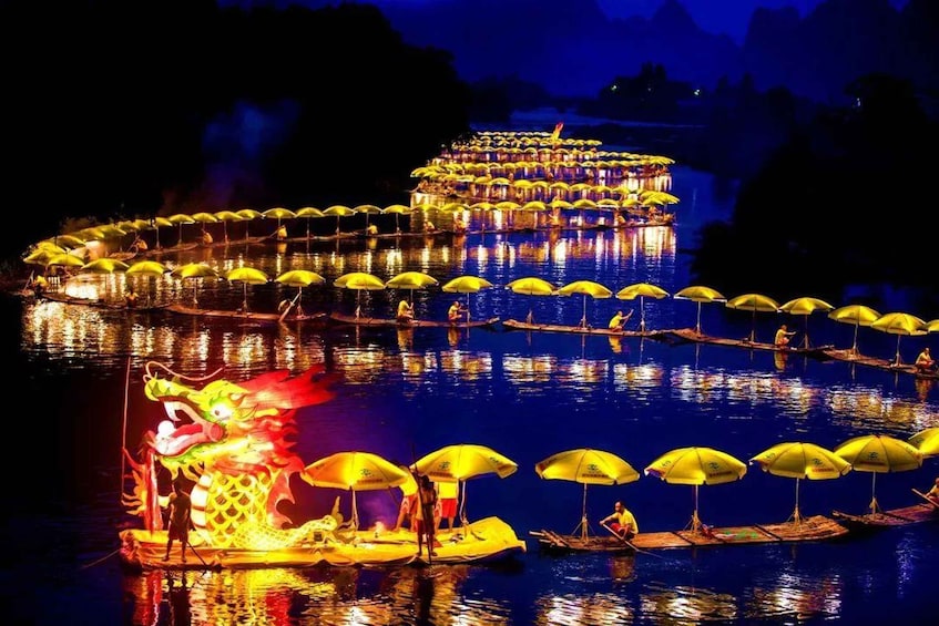 A nighttime river scene with illuminated boats and a dragon float. 3