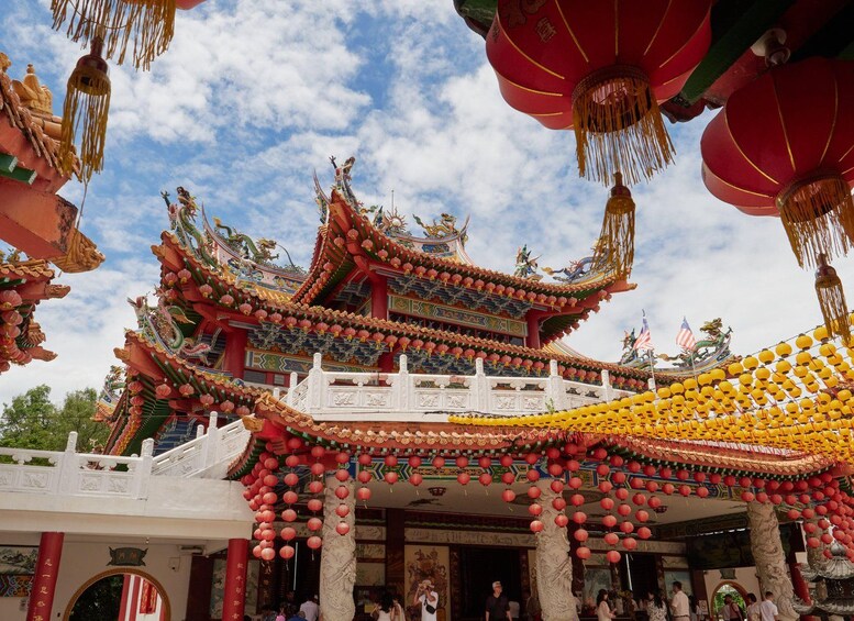 A traditional Chinese temple with ornate architecture, red lanterns, and intricate decorations. 2