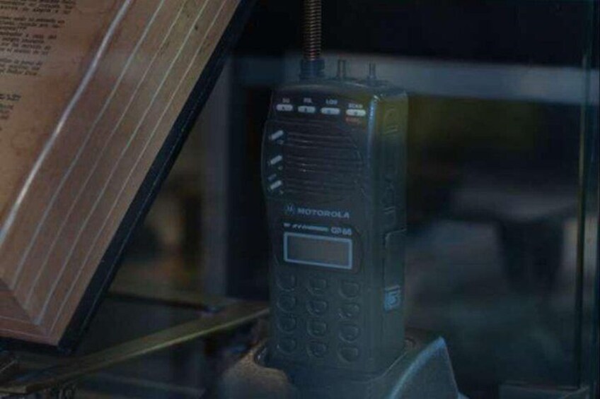 A Motorola mobile phone on a stand. 3