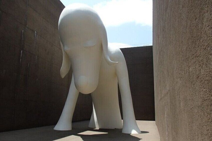 A large white sculpture in an outdoor setting. 2