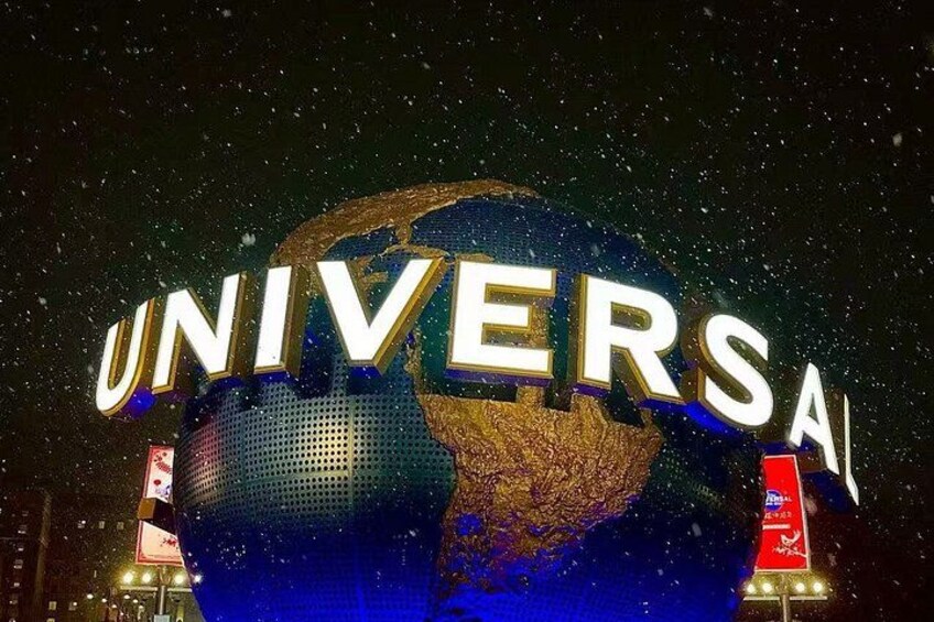A large illuminated globe with the word 'UNIVERSAL' prominently displayed. 1