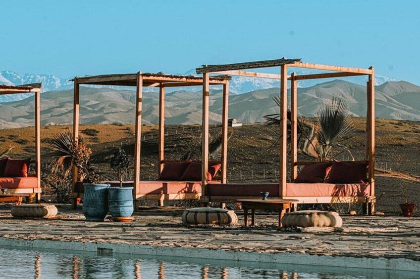 Outdoor seating with a mountainous backdrop. 4