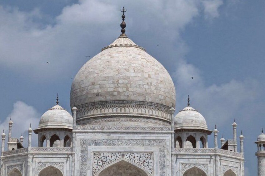 The Taj Mahal's central dome and minarets. 2