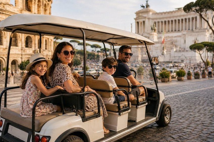 A golf cart with four passengers on a cobblestone street, with historical architecture in the background. 2