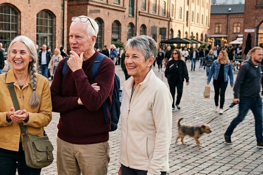 A cobblestone street with pedestrians and a dog. 5