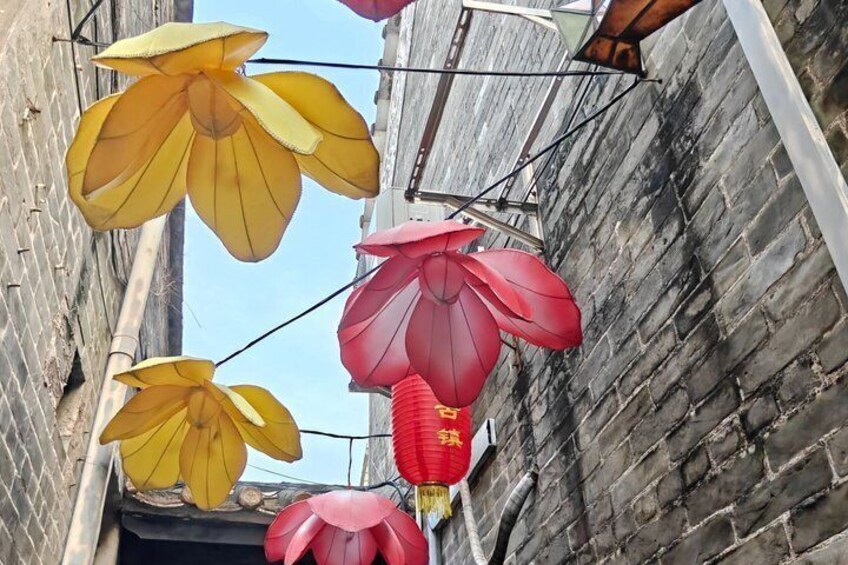 Hanging lanterns in yellow and red colors. 2