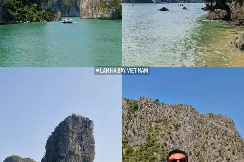 A boat on calm water, a rocky coastline, and a large rock formation. 2