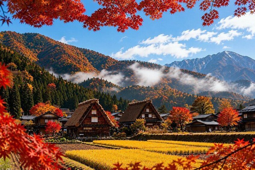 A village with traditional houses, autumn foliage, and mountains in the background. 5