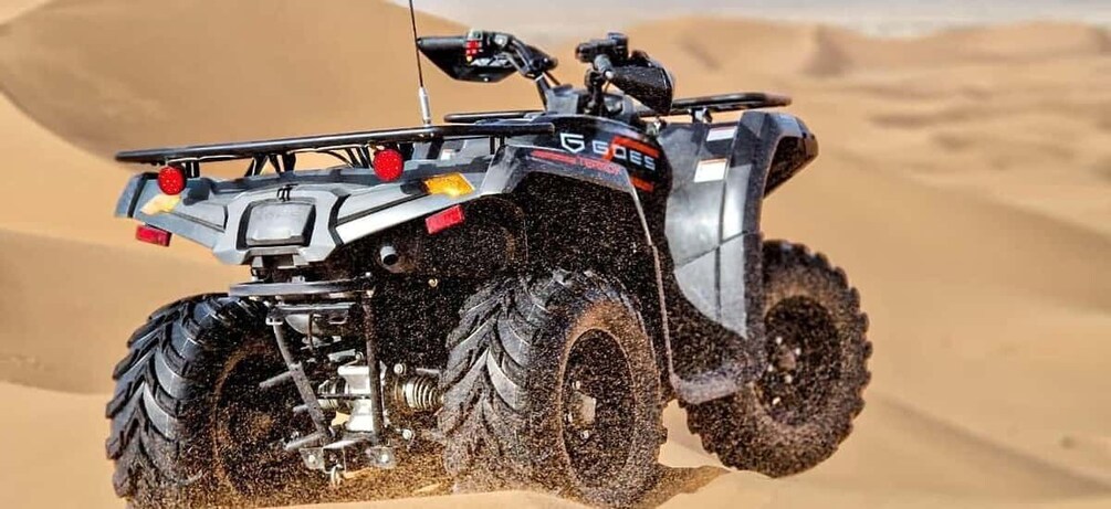 A quad bike in a desert environment. 2