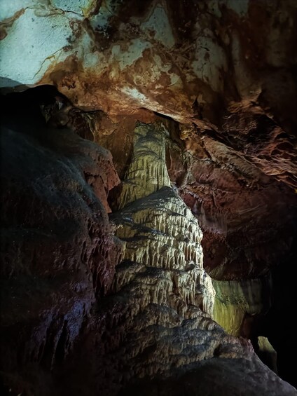 A cave with stalactites and stalagmites. 4