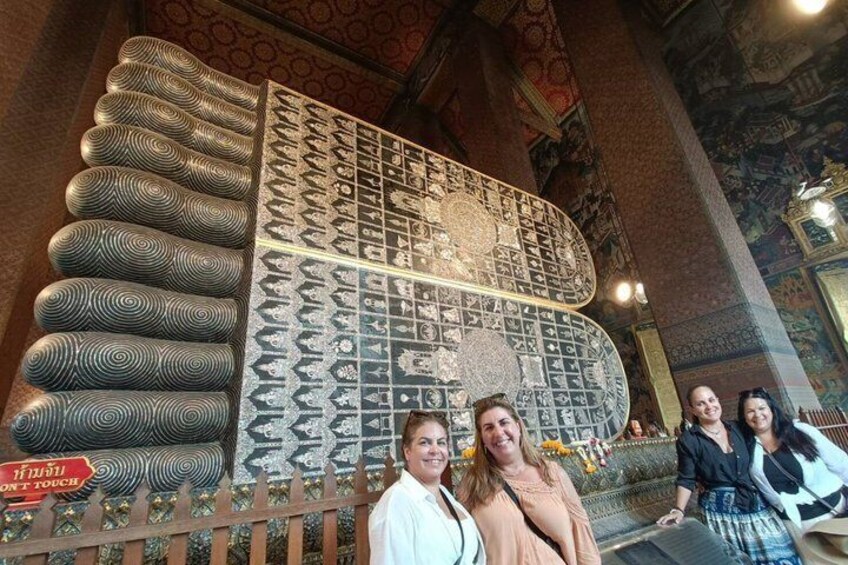 A large, ornate, patterned wall with a sign that reads 'Touch Me.' 3