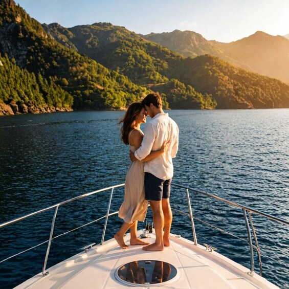 A couple embracing on a boat with a mountainous landscape in the background. 2
