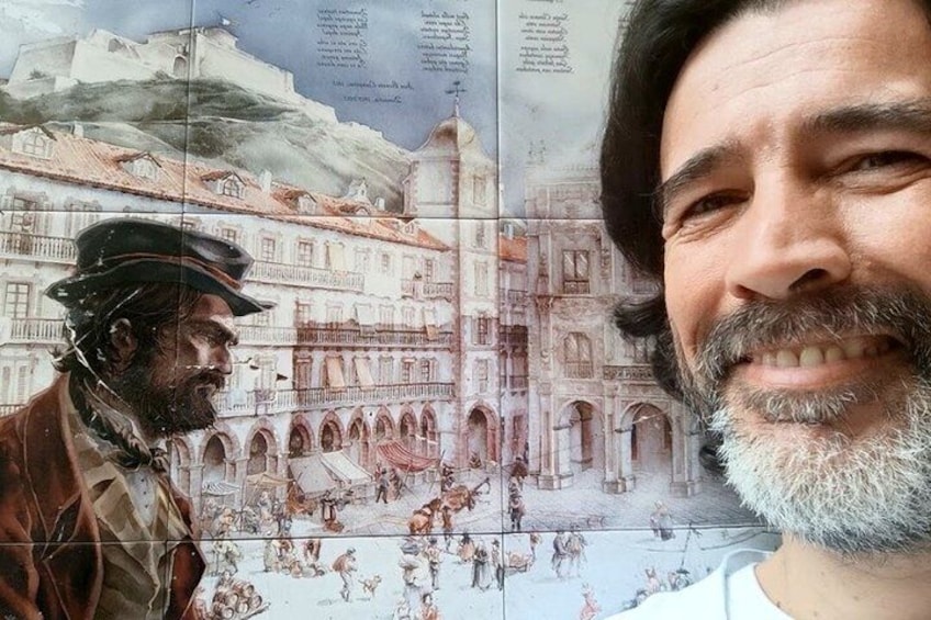 A historical painting of a town square with buildings and people. 1