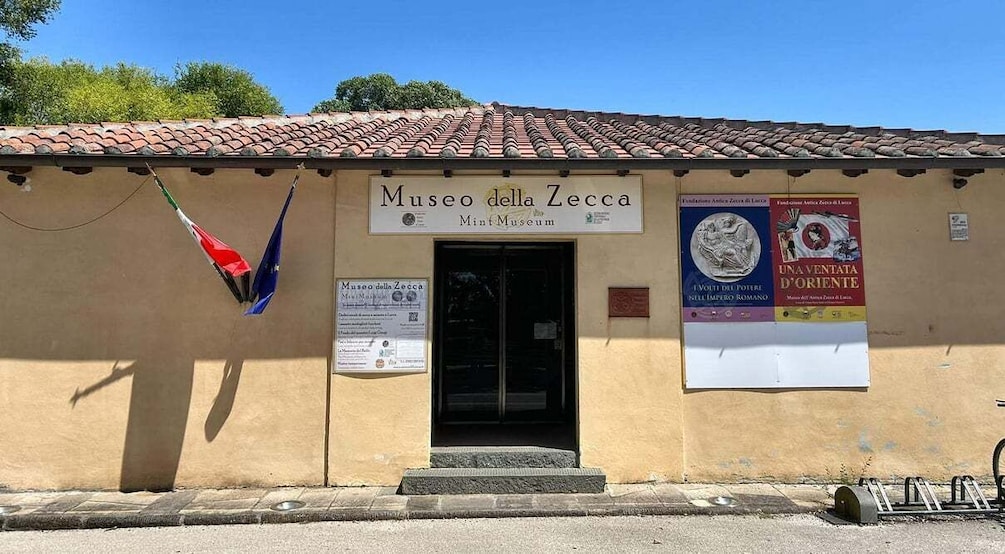 A building with a sign reading 'Museo della Zecca MintMuseum.' 4