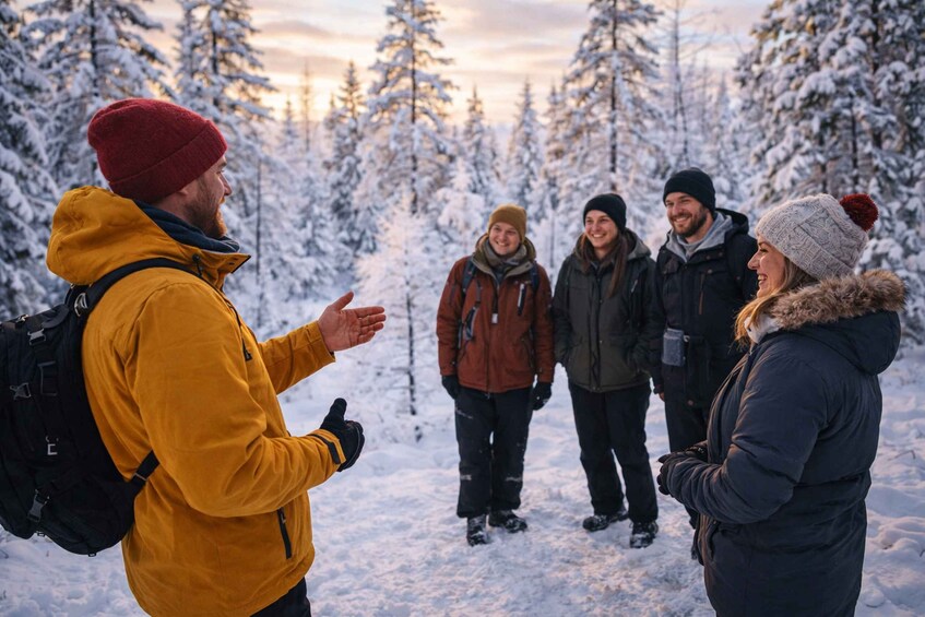 A group of people in a snowy forest. 2