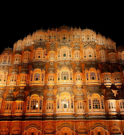 A brightly lit historical building with ornate architecture and multiple domes. 2