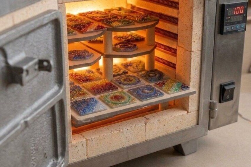 A food dehydrator with trays of colorful food items. 3