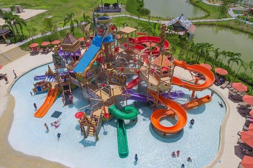 A water park with multiple slides and pools. 5