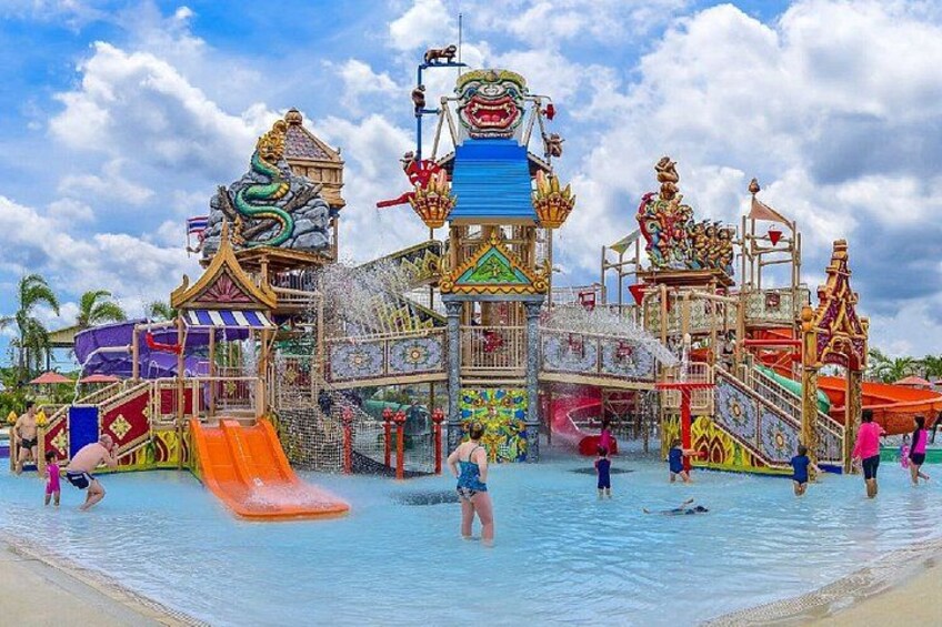 A water park with colorful slides and structures. 2