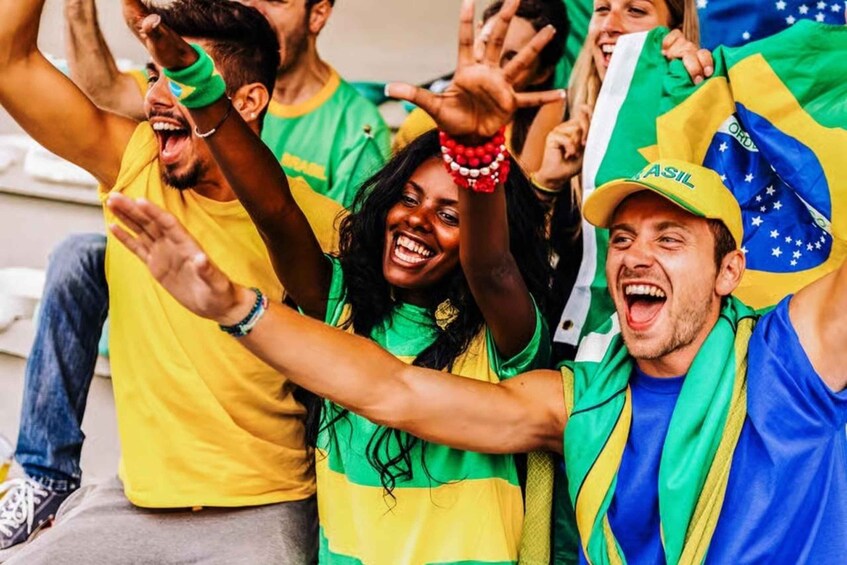 People wearing Brazil national team jerseys and hats. 5