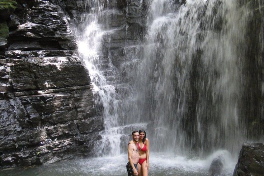 A waterfall cascading down a rocky cliff. 2