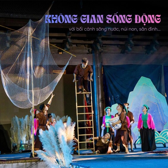 A stage with a net structure, people in traditional attire, and a ladder. 5