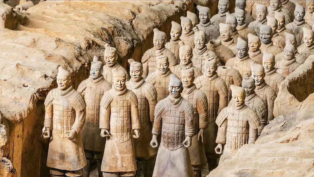 A row of terracotta soldiers in a tomb. 5