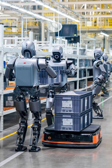 Industrial robots working in a warehouse. 3