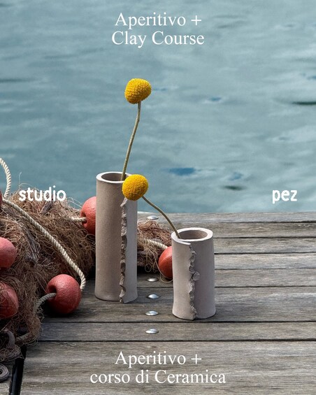 A wooden dock with pottery items and text overlays. 1