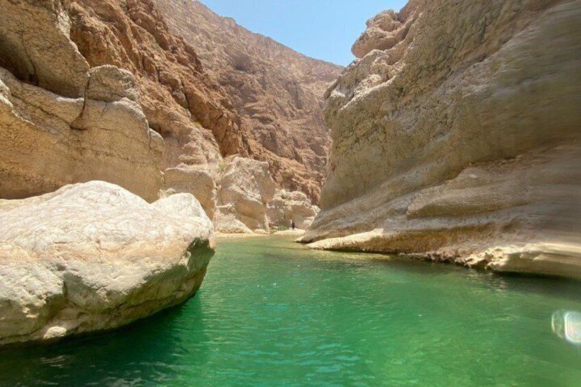 Group Tour to Wadi Shab Trek Swim Sinkhole and Fins Beach 3